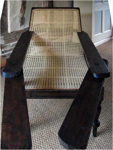 This image shows a front view of a Tea Planter chair
that has been restored to its former glory by Sue Marsdon.