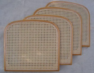 A picture of four woven panels for a set of Bauhaus style chairs.