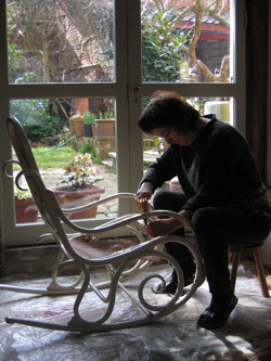 This picture shows Sue at work on the
Thonet chair, removing the original tatty cane.